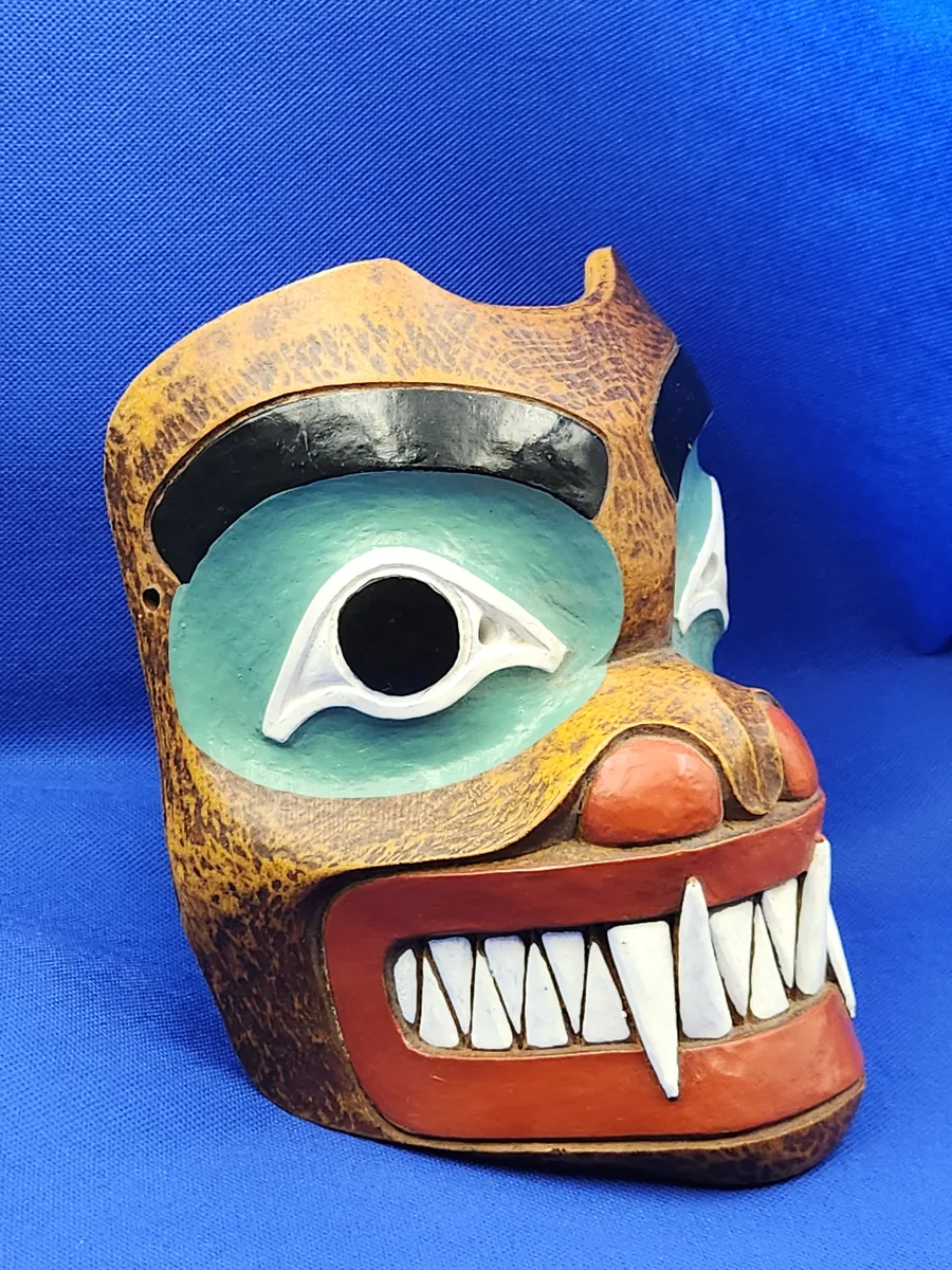 Hand-carved and painted bear mask