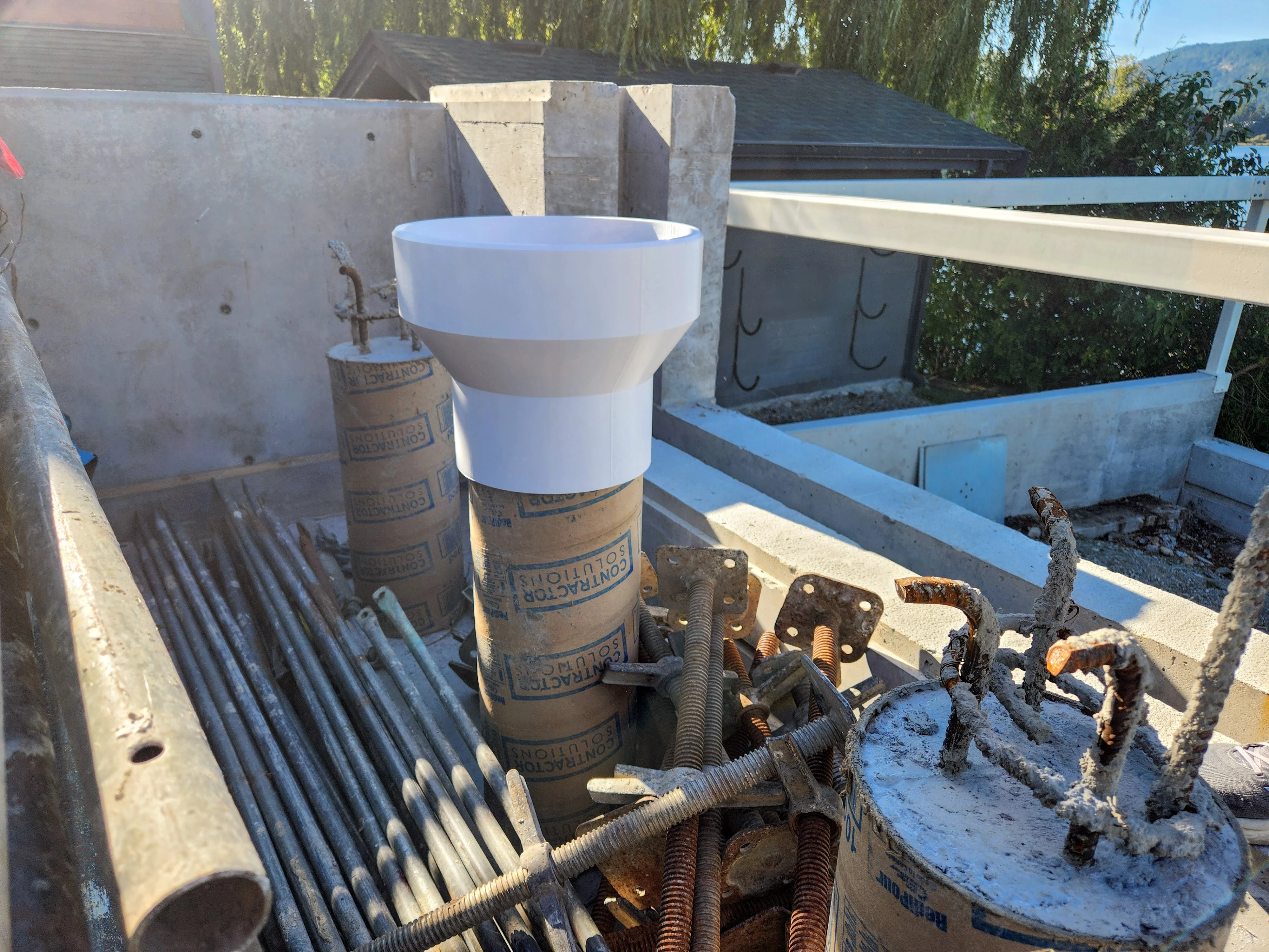3D printed concrete form with rebar inside on a post