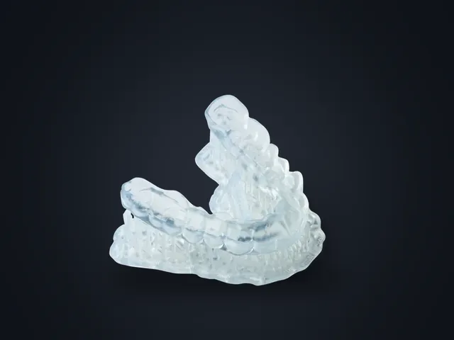 Clear splint printed in Dental LT Comfort resin, seated on a 3D printed dental model