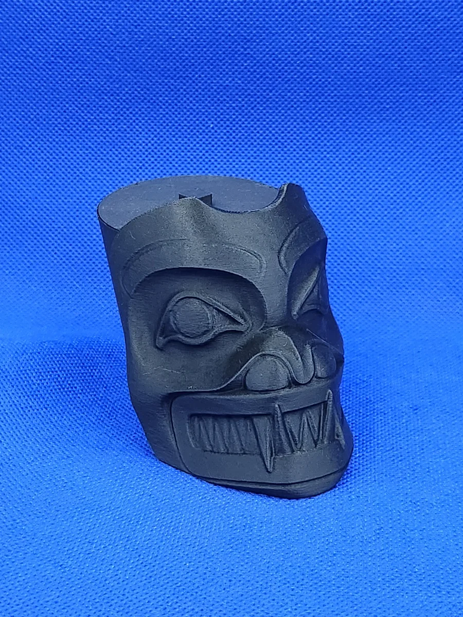 Miniature black 3D printed urn in the shape of the bear mask
